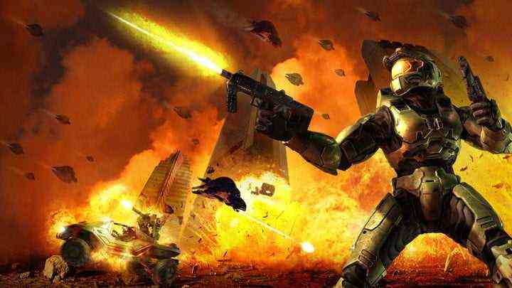 Master Chief shooting an SMG in a burning city.
