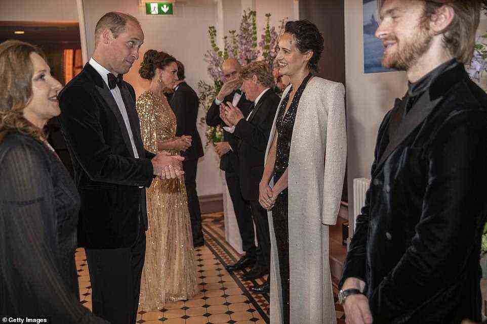 When William met Phoebe: Prince William also stopped to talk to screenwriter Phoebe Waller-Bridge who wore a chic coat slung over her shoulders