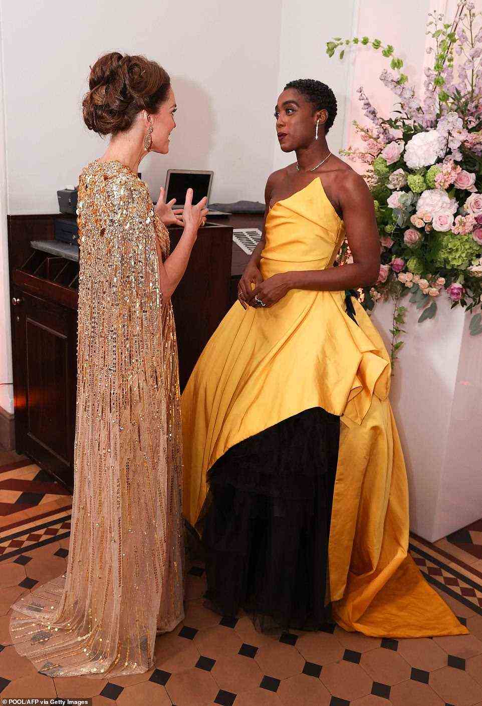 Chatting away: Lashana and Kate also appeared deep in conversation with the former putting on an animated display