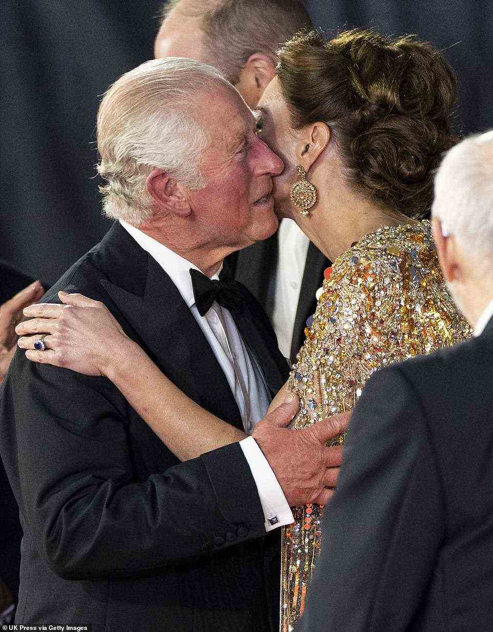 Prince Charles greets Kate after arriving at the Royal Albert Hall