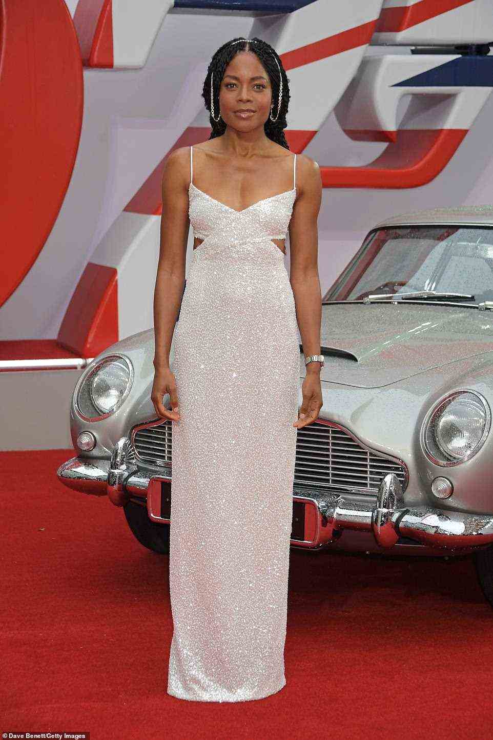 Wow: Naomie Harris looked stunning when she stepped onto the No Time To Die red carpet at the Royal Albert Hall on Tuesday