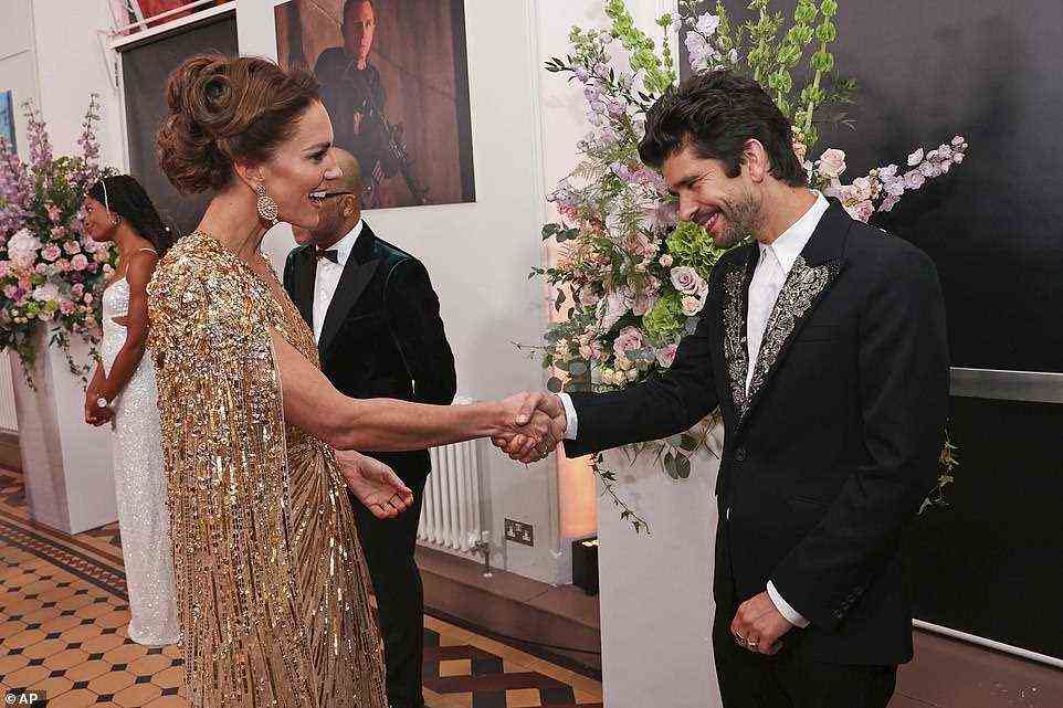 Sweet: Q actor Ben Whishaw couldn't contain his delight as he shook hands with Kate