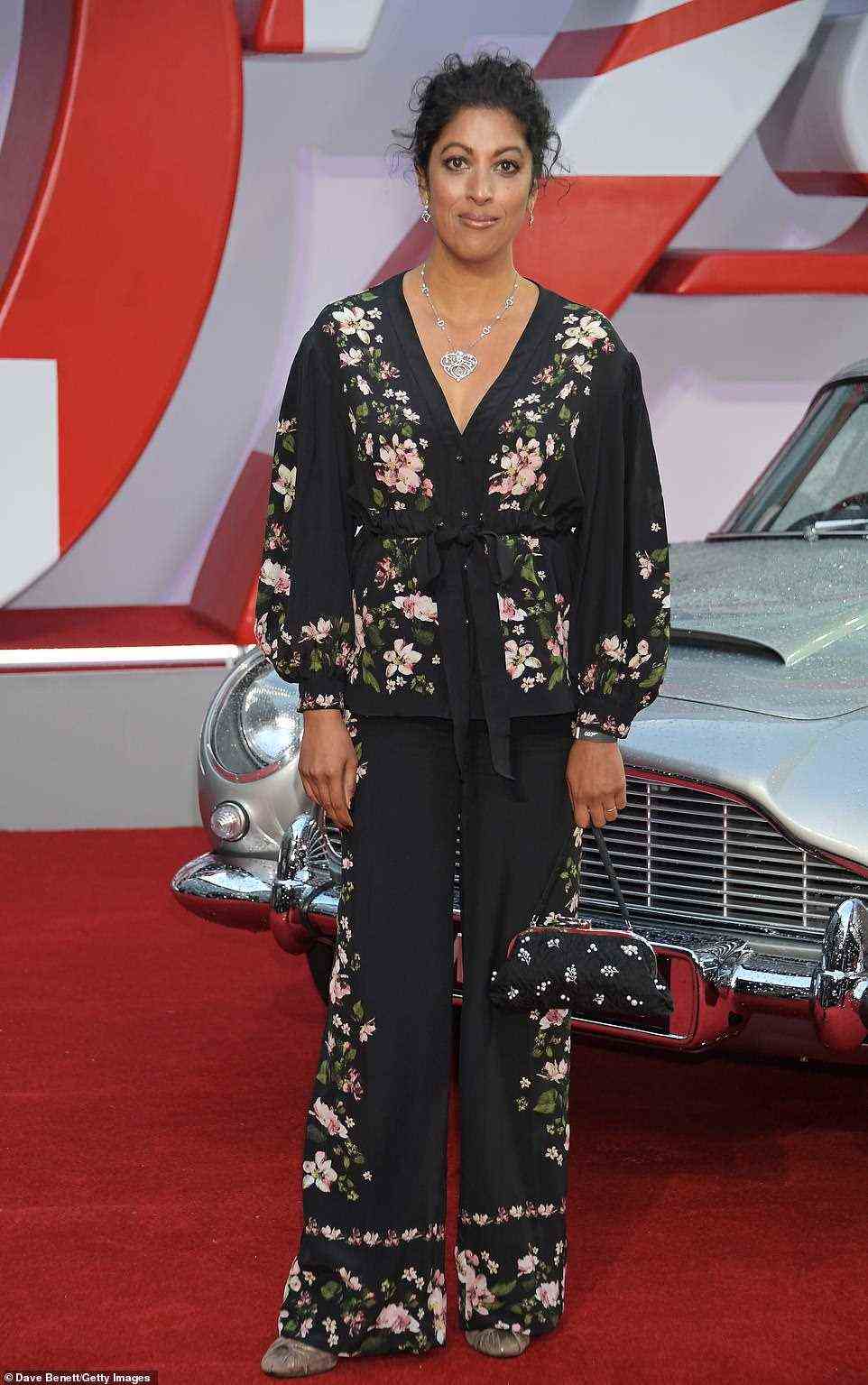 Floral: Actress Priyanga Burford stepped onto the carpet wearing a striking floral wraparound top and matching trousers