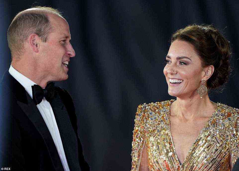 All in the details: Kate accessorised with a striking pair of gold drop earrings and opted for an expertly-applied face of natural-look glam