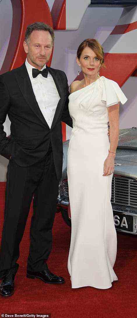 Glamorous: Spice Girl Geri Horner donned a glamorous white dress and beamed while posing with her husband Christian