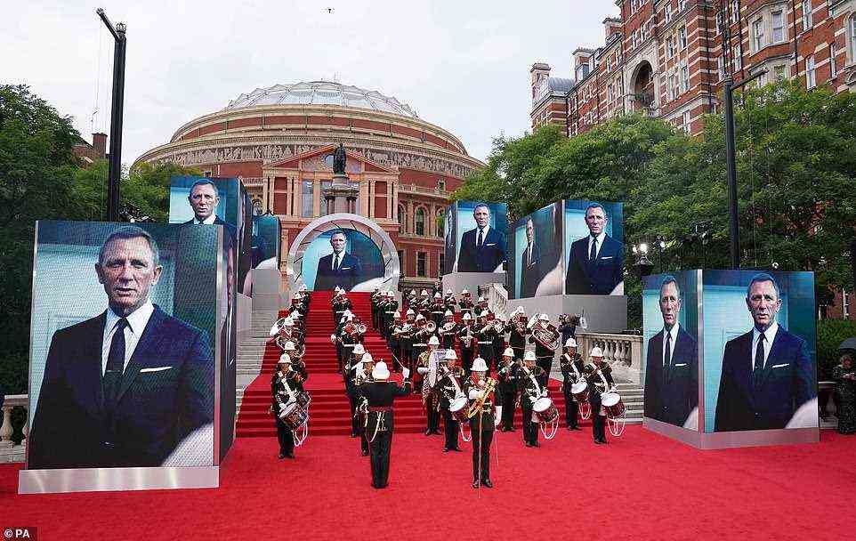 Bond: Posters of Daniel lined the red carpet as the band performed