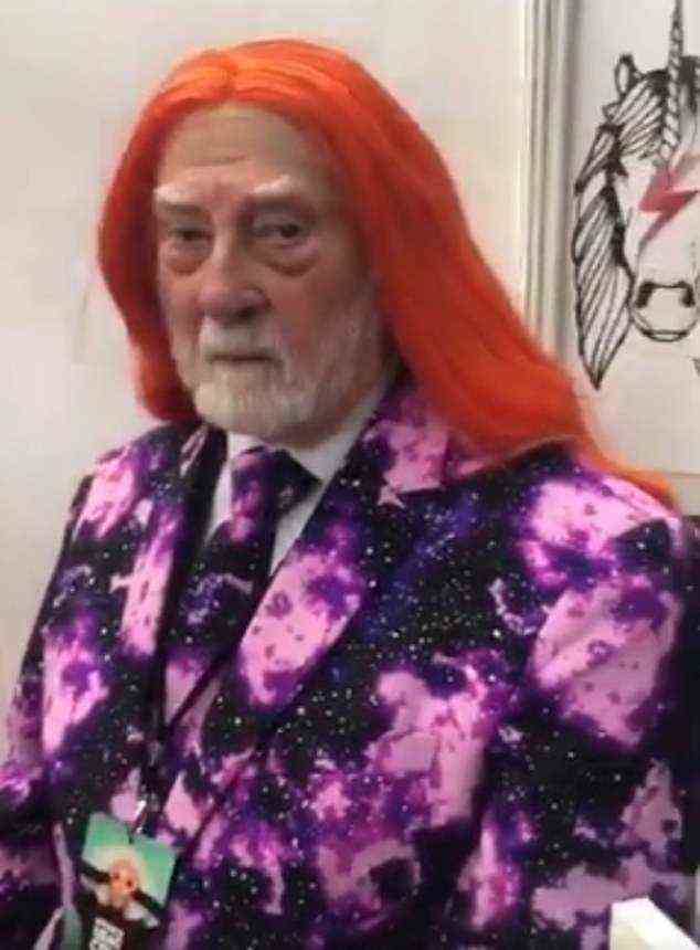 The look: Denise previously shared a clip of Vin as he got ready for one of his shows in an orange wig and purple suit
