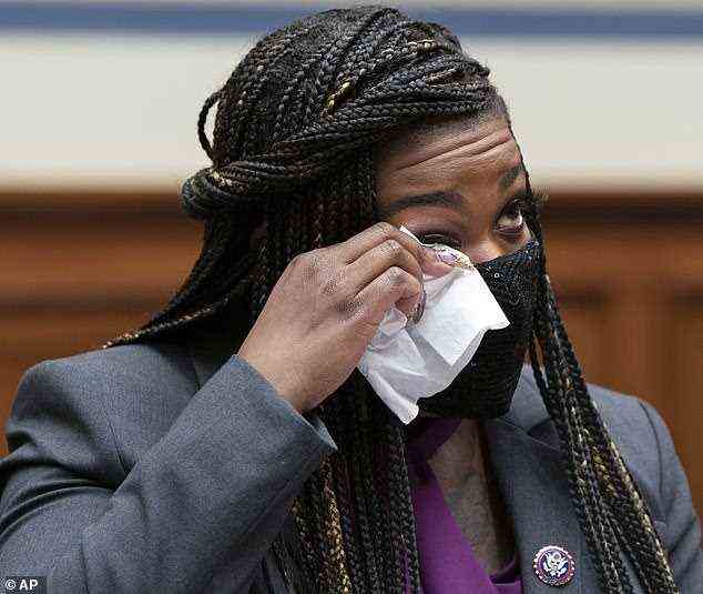 Upset: Democratic Representative Cori Bush broke down in tears during an Oversight Committee hearing on reproductive rights after sharing her own abortion story