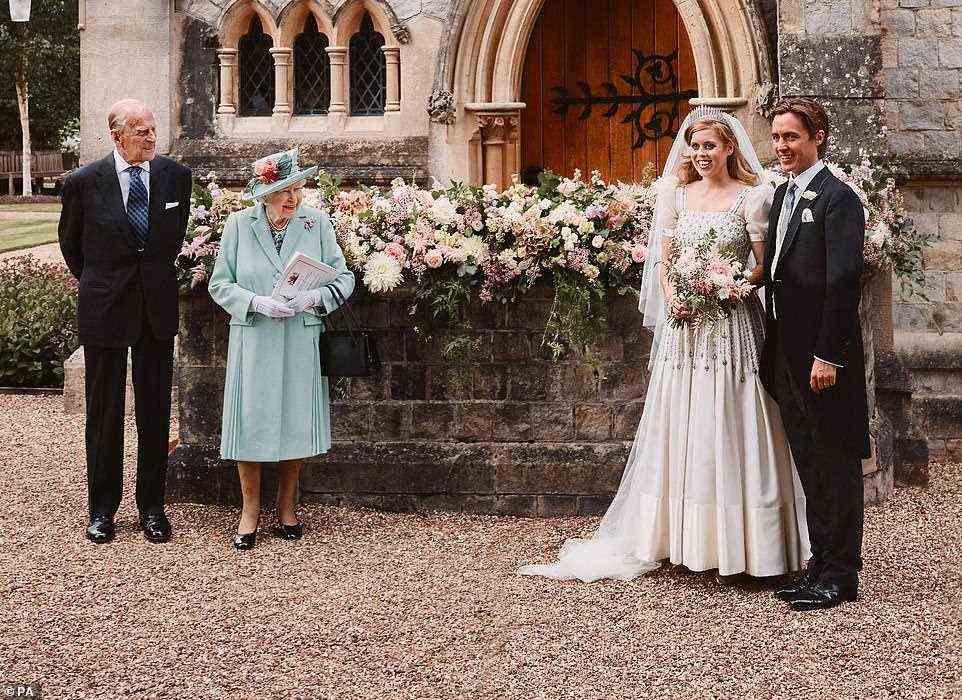 Princess Beatrice enjoys a close relationship with the Queen and wore her grandmother's dress on her wedding to Edoardo in July last year. Pictured, the newlyweds with the Queen and Prince Philip at their Windsor Castle nuptials