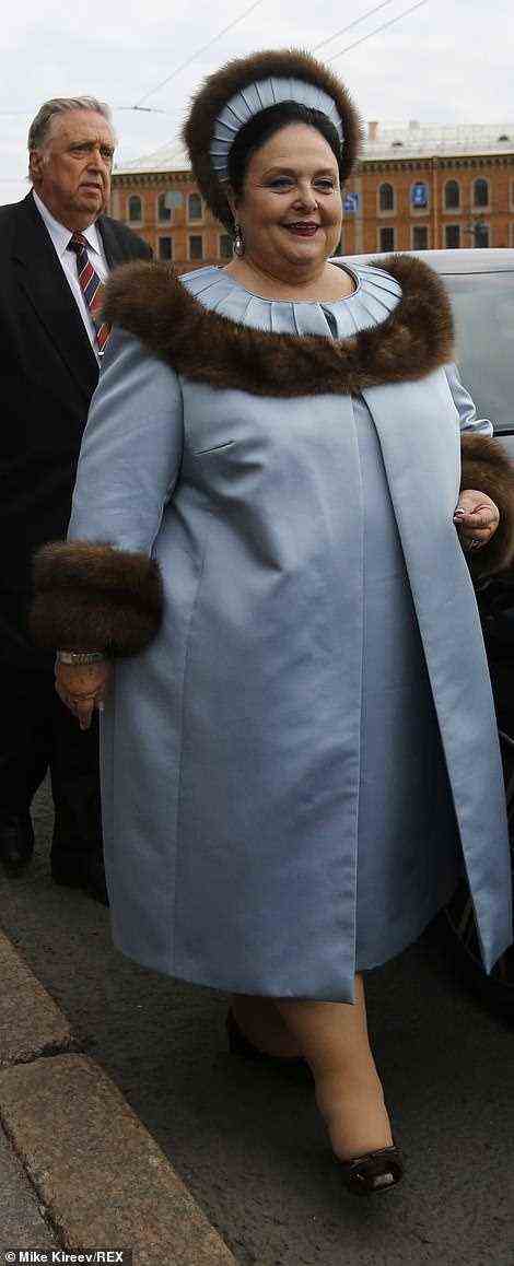 Glowing with pride: The groom's mother Grand Duchess Maria Vladimirovna beamied with happiness as she arrived for the ceremony in a fur-trimmed ensemble