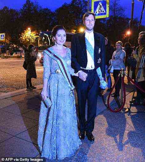 Albania's pretender to the throne, Crown Prince Leka Zogu II, the grandson of self-proclaimed King Zog and his wife Elia Zaharia arrive to attend the evening gala dinner