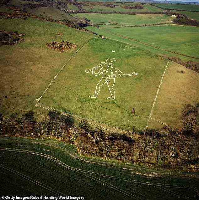 Der Cerne Abbas Giant in Dorset, England, ist eine 180 Fuß große nackte männliche Figur mit einer prominenten Erektion und einem großen Keulen
