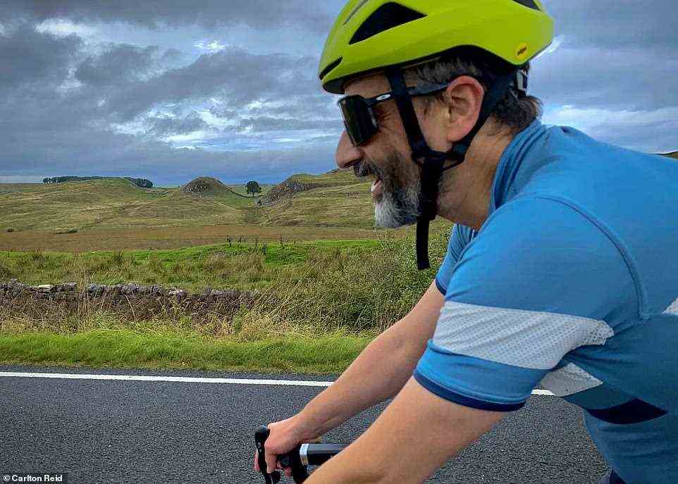 Ted is pictured here making steady progress through the Northumberland National Park, with Sycamore Gap and Hadrian's Wall in the background