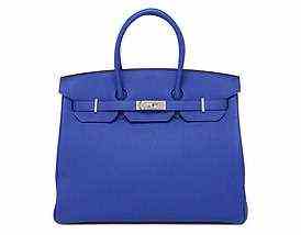 Hermes bags don't come cheap, and even second-hand, Petra's limited-edition affairs are likely to cost many thousands of pounds. Pictured: £9,500 Electric blue Hermes Birkin bag