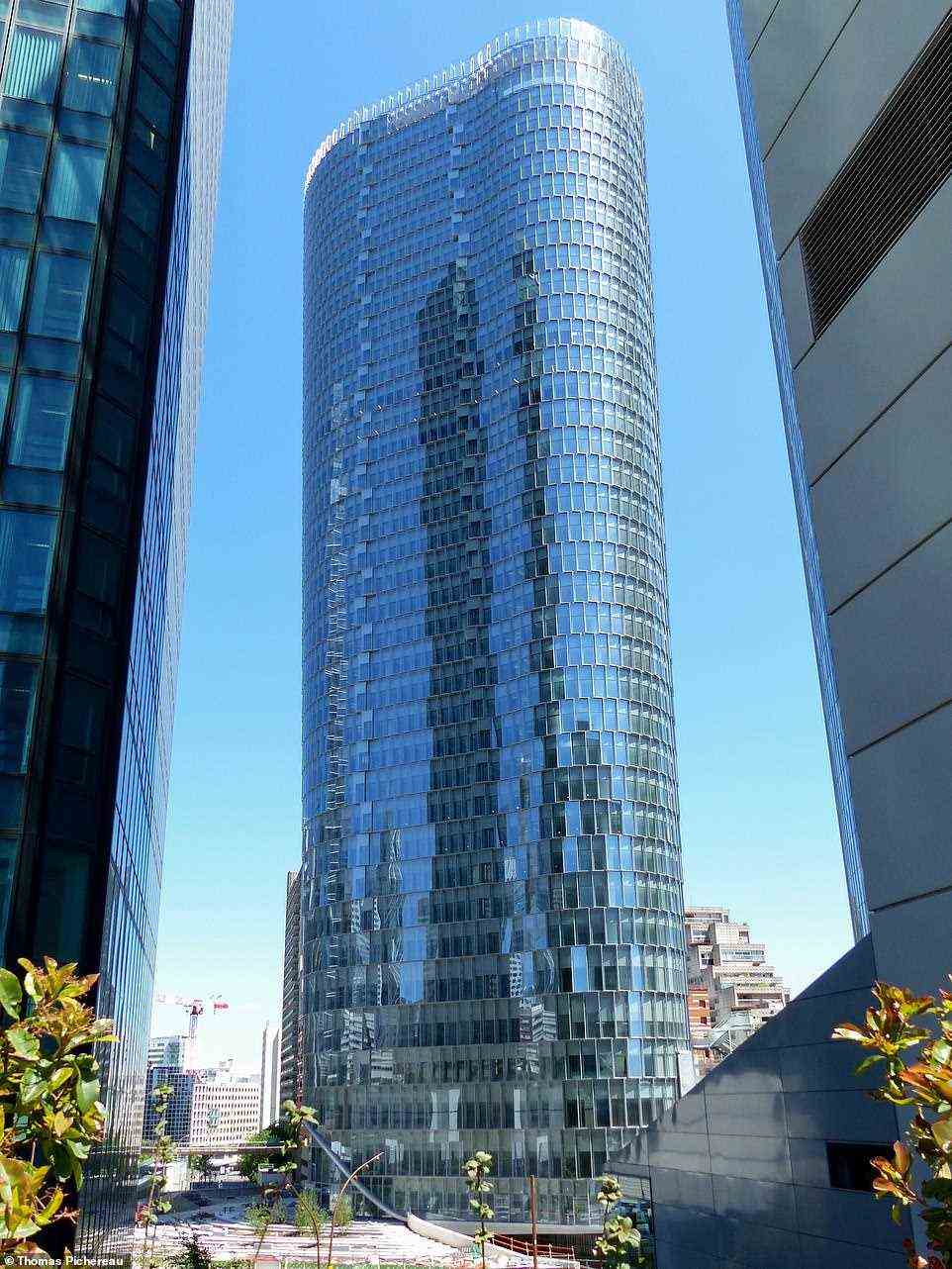 Pictured is Tour Alto in Courbevoie in the metropolitan area of Paris, which ranks sixth and was conceived by IF Architects and SRA Architectes. Sweeping into the sky, the building is 38 storeys tall and 160 metres (525ft) in height. It features 3,800 glass blocks on the facade, and there is a ventilated double facade made up of a second layer of glass. The unconventional design sees the floor area widen as you ascend the building, increasing from 700 metres squared at the base to 1,500 metres squared at the top