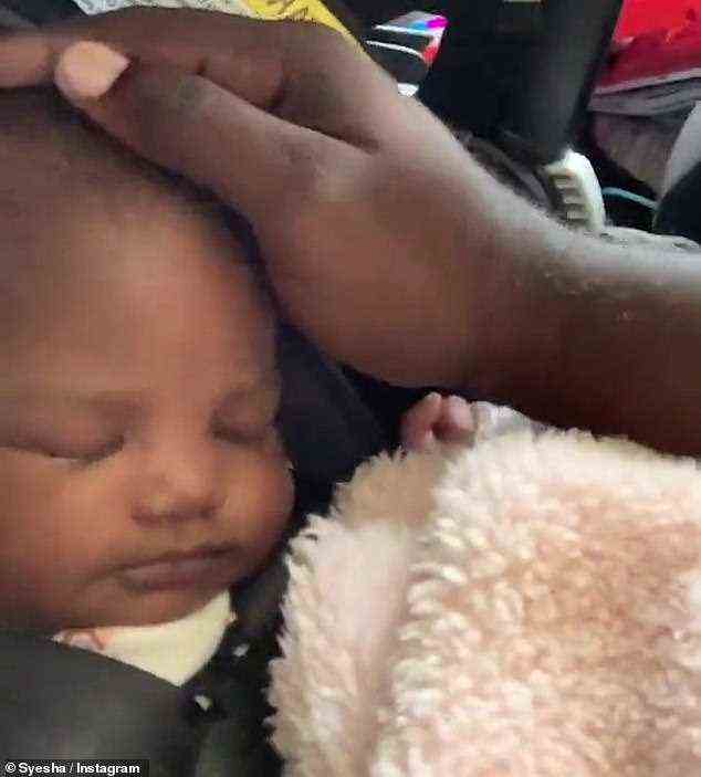 Sleeping peacefully: Their 13-day-old daughter Ast had been taken away by Child Protective Services but Tyron revealed in August that they have gotten her back