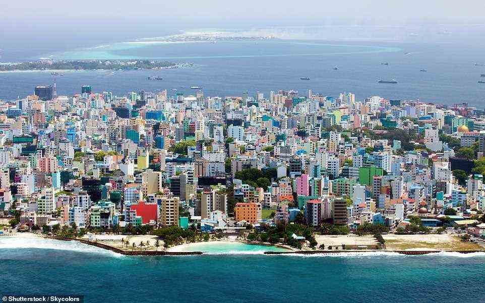 The bustling capital of Male (pictured above), with its markets and mosques, is a must-see on a trip to the Maldives