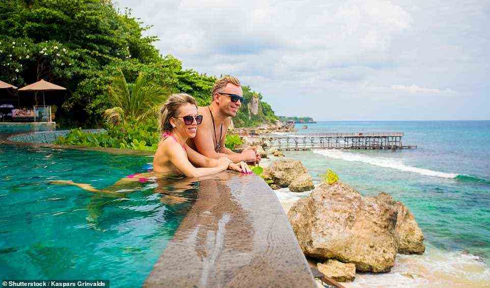 Visit Bali, a country that is home to many fine beaches and a tropical interior that is fantastic to explore by hire car