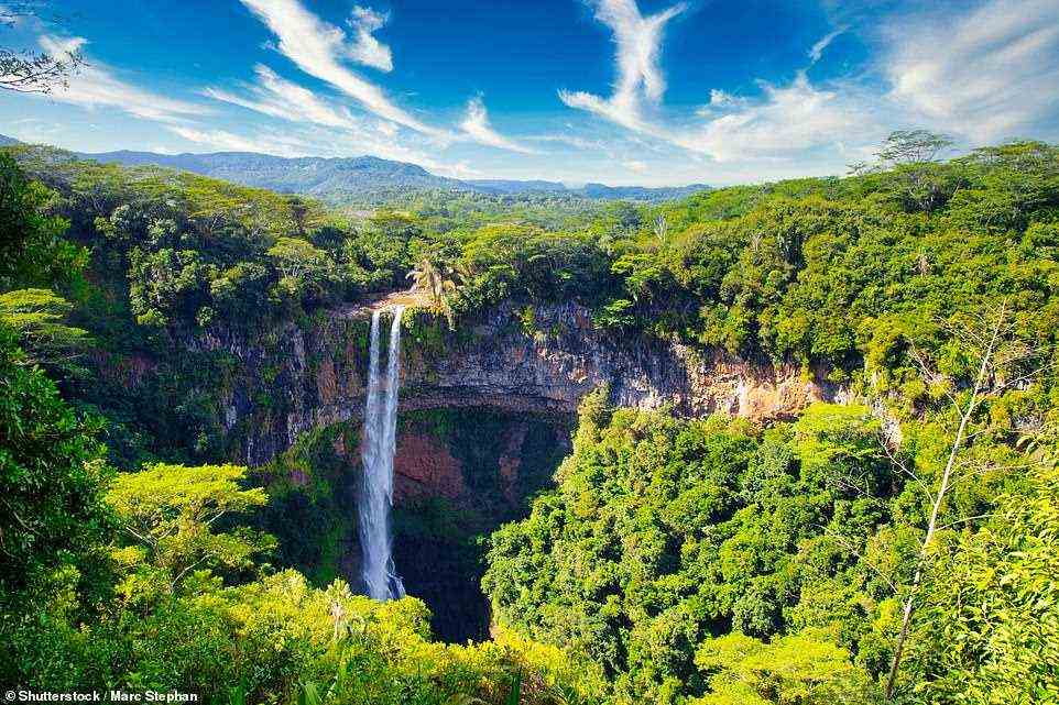 Pictured is the Chamarel Waterfall - waterfall visits and rainforest hikes are just some of the activities holidaymakers can experience in Mauritius