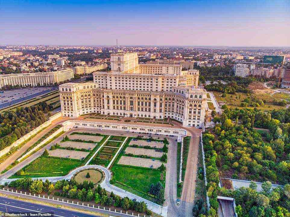 PALACE OF THE PARLIAMENT, BUCHAREST, ROMANIA: This sprawling communist structure, constructed between 1984 and 1997,  is the world's second-biggest administrative building by surface area after the US Pentagon, thanks to a floor area of 365,000 square metres (3,930,000 sq ft). And it holds the Guinness World Record for being the planet's heaviest building, thanks to 700,000 tonnes of steel and bronze combined with 35. million cubic feet (1 million cubic m) of marble, 3,500 tonnes of crystal glass and 31.7million cubic feet (900,000 cubic m) of wood