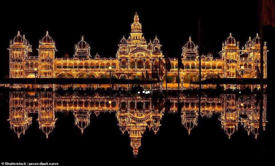 MYSORE PALACE, KARNATAKA, INDIA: This spectacular palace in the south Indian state of Karnataka was built in 1912 for the Wodeyar dynasty, who ruled over the Kingdom of Mysore from 1399 to 1947. The website Know India says of the palace, which is now a visitor attraction: 'Built in Indo-Saracenic style with domes, turrets, arches and colonnades, the palace is often compared with the Buckingham Palace of Britain because of its grandeur. Henry Irwin, the British consultant architect of Madras state, designed it'