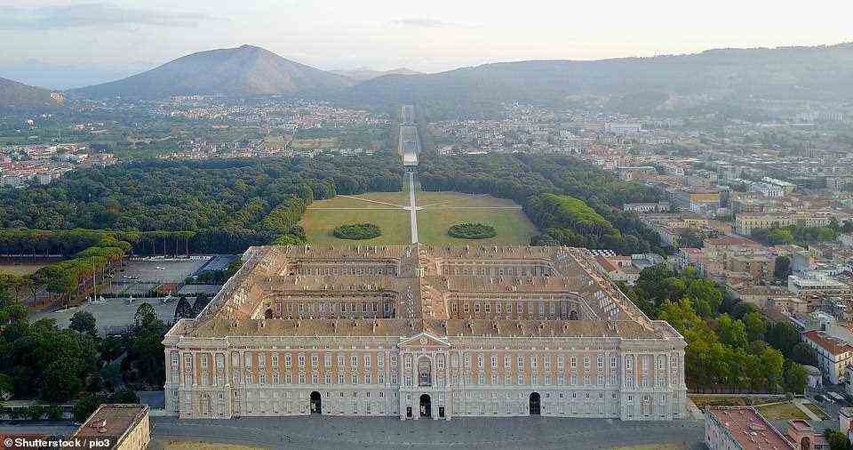 ROYAL PALACE OF CASERTA, ITALY: This expansive Baroque-style palace was commissioned by Charles III, the king of Naples, in the mid-18th century as a royal residence and as a rival to the Palace of Versailles. Musement.com notes that it took several decades to complete the palace and the finished building features more than 1,200 rooms and 1,742 windows. It also highlights that the palace also had 'an outrageously high cost'. This was 6,000,000 ducats, or around £700million ($950million)