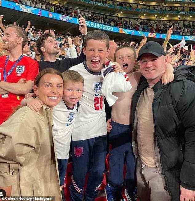 Family: The 35-year-old WAG married Wayne in 2008 and the couple have four sons (pictured earlier this year with sons Kai, 11, Klay, eight, and Kit, five)