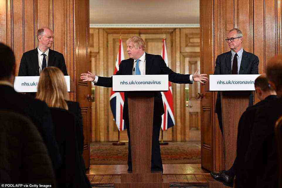The inquiry found that Ministers failed to challenge flawed advice from Government scientists which allowed Covid to rip through Britain. Pictured: Chief Medical Officer Chris Whitty (L) and Chief Scientific Adviser Patrick Vallance (R) look on as Britain's Prime Minister Boris Johnson hold one of the daily press conferences to address the nation in March last year