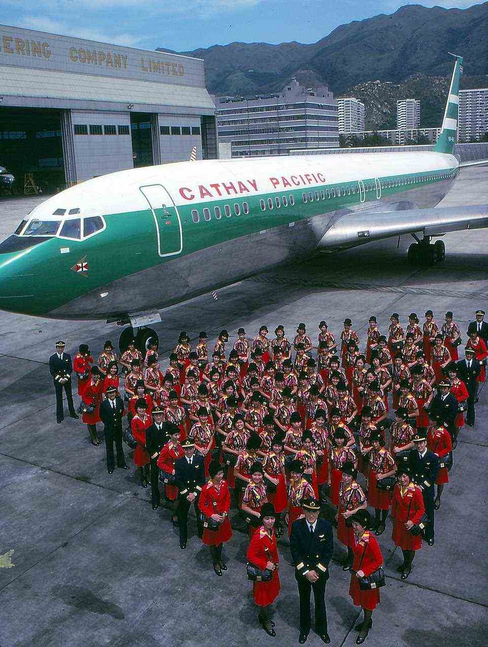 Further fleet and network expansion was seen in the early 1970s. Seen here, the brand-new Boeing 707, with Cathay Pacific staff wearing a brand-new uniform called the Eastern Sea, designed by Pierre Balmain
