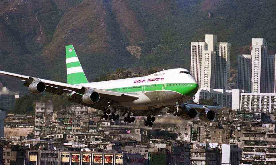 With Hong Kong being Cathay Pacific's home hub, its Boeing 747s landing in one of the most extreme airports in the world - Kai Tak - constitute some of the most iconic civil aviation images of all time. Pilots landing at Kai Tak (above before it closed in 1998) required special certification and training. With Cathay pilots performing the demanding landing day in, day out, they were often regarded as some of the most skilled pilots in the world, mastering one of the world's most complex approaches - including a 47-degree sharp turn and flying a few hundred feet above apartment blocks before landing on a runway susceptible to crosswinds