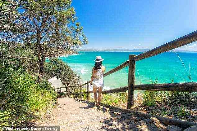 Premierminister Scott Morrison hat versprochen, die internationalen Reisen für Einwohner von NSW zu beschleunigen, sobald die häusliche Quarantäne verfügbar ist (im Bild eine Frau in Byron Bay).