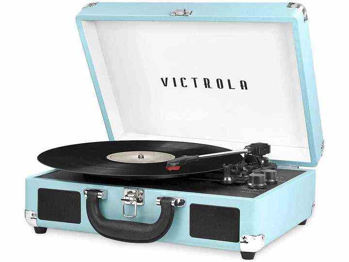 The Victrola portable suitcase turntable playing a vinyl record.