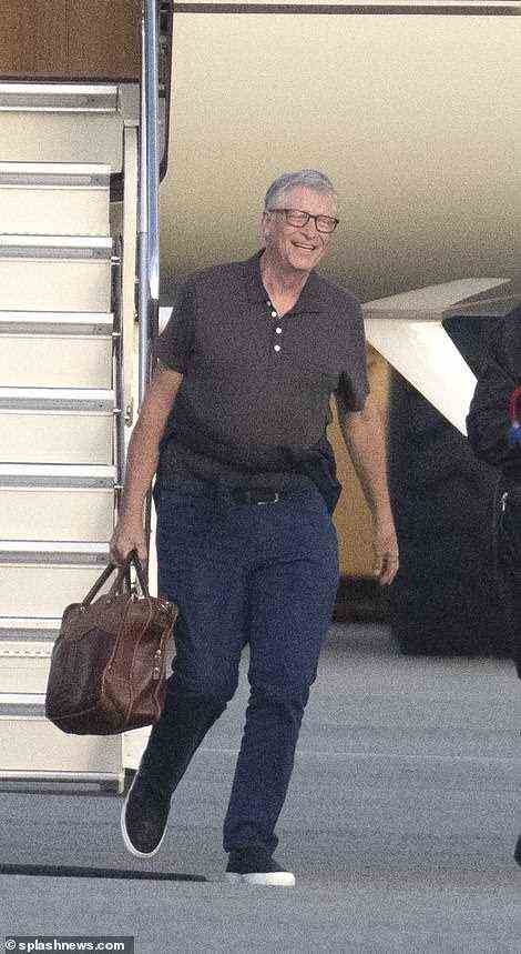 The father of the bride, worth an estimated $132 billion, was all smiles as he touched down on the East Coast