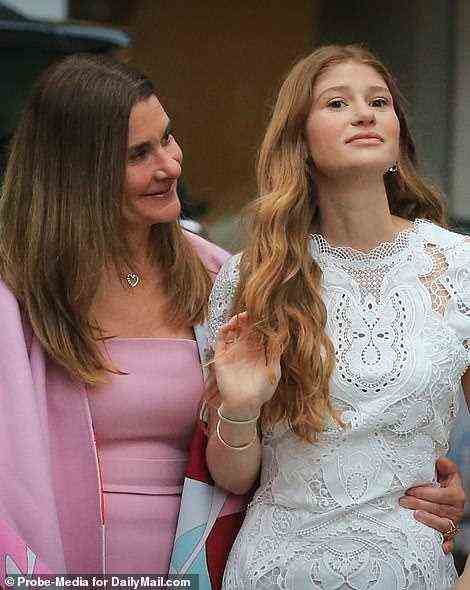 The 57-year old philanthropist wore a pink dress with a matching wrap, while her daughter wore a white lace dress as they arrived at the Plaza Hotel