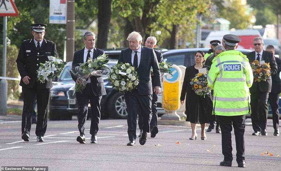 Dressed in black, the leading politicians from both sides of the political spectrum carried wreaths to lay at the site in Leigh-on-Sea, Essex