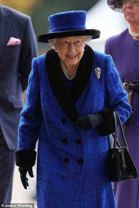 The Queen is all smiles as she attends the event