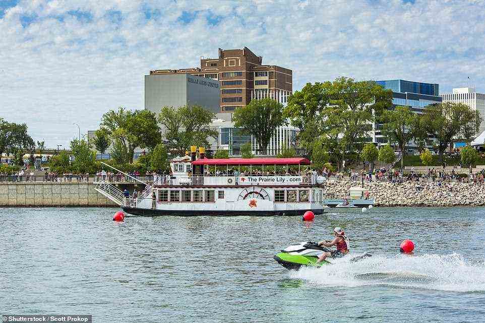 Enjoy a cruise down the South Saskatchewan River during a trip to the prairie city of Saskatoon, pictured above