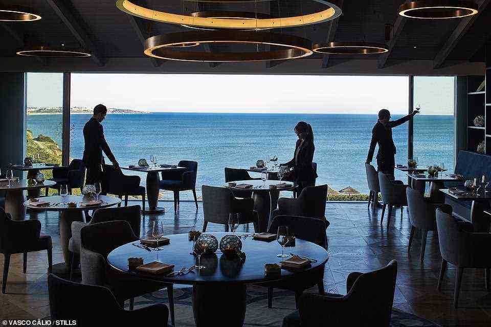Vila Vita Parc's Ocean restaurant is pictured above. There, the 'sublime sea views' are the 'perfect backdrop' to the cuisine, according to Jane Knight