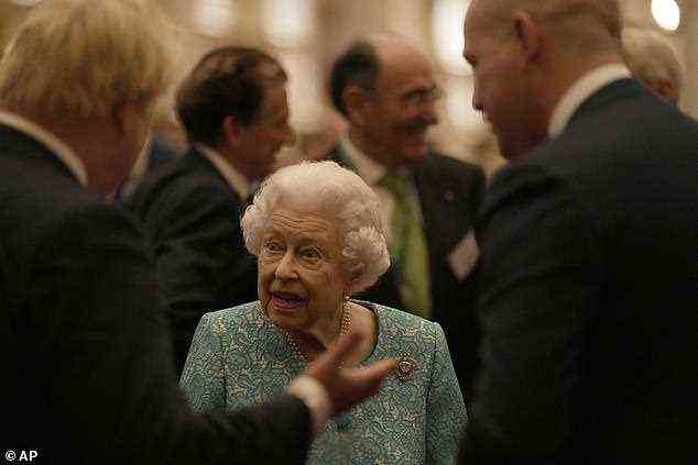 The Queen seemed riveted by her conversation with the Prime Minister and another guest tonight