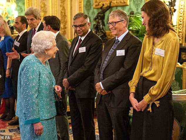 Father-of-three Bill Gates and other guests smiled as the Queen exchanged words with them