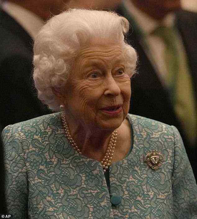 The Queen donned three rows of pearls and matching earrings as well as a Diamond brooch for tonight's event