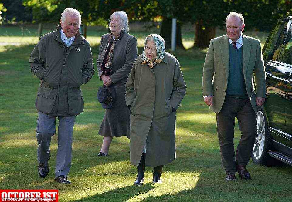 October 1 -- The Queen and Prince Charles walk to the Balmoral Cricket Pavilion to plant a tree to mark the start of the official planting season for the Queen's Green Canopy on the Balmoral Estate in Scotland