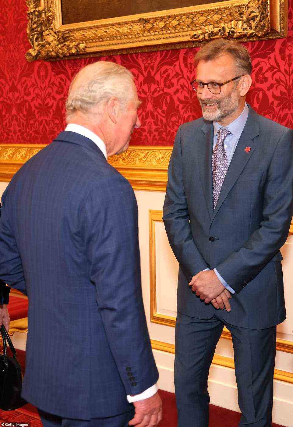 A smartly dressed Hugh Dennis also spoke with Prince Charles during the award's ceremony this evening