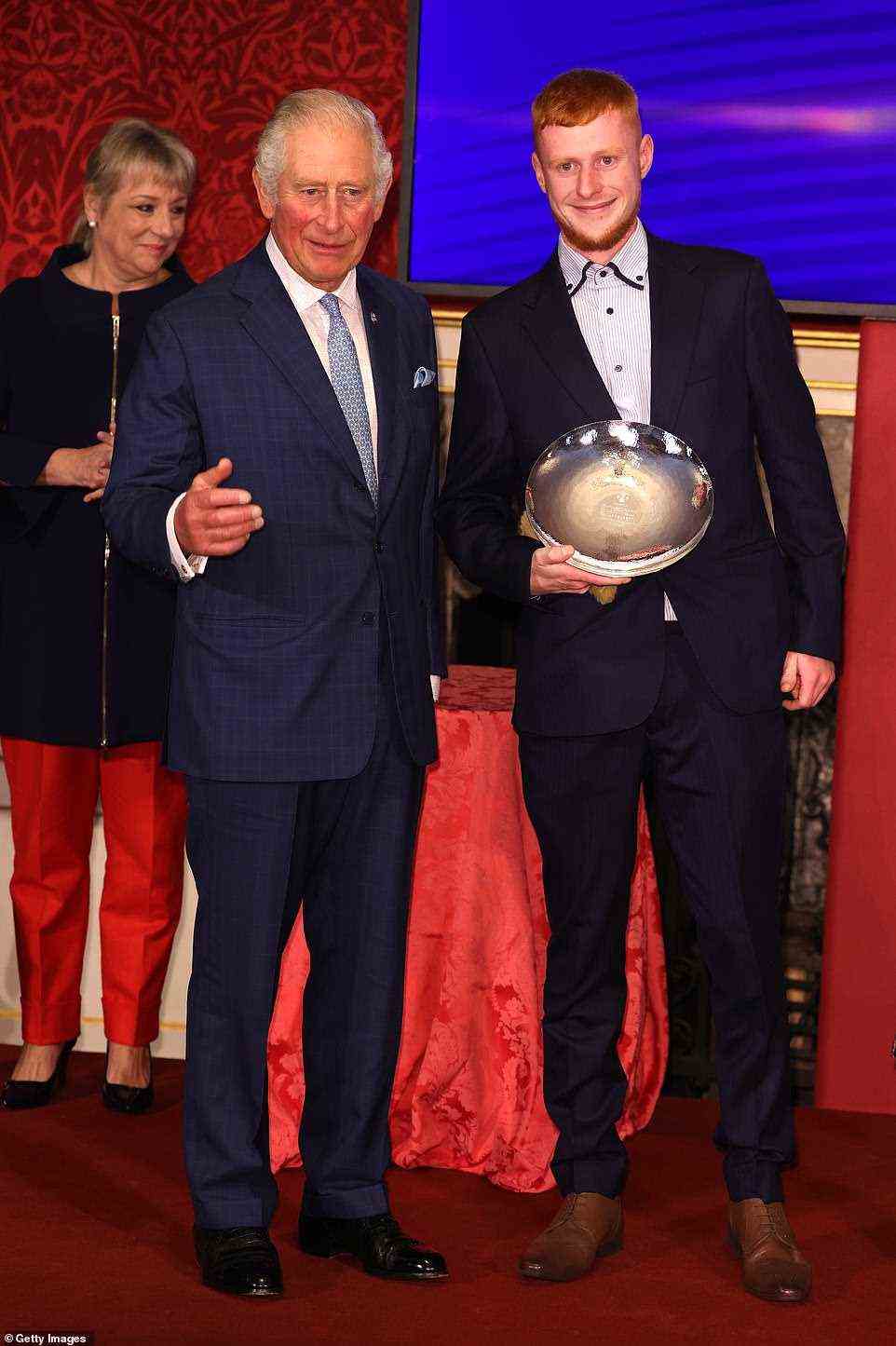 The Prince of Wales alongside winner of the Homesense Young Achiever Award, Thomas Pemberton