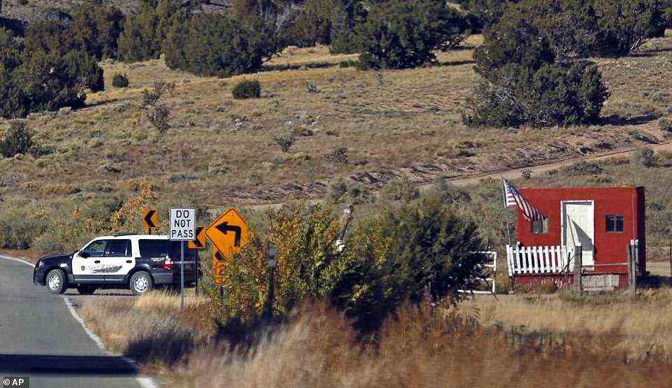 The Santa Fe County Sheriff's Officers respond to the scene of a fatal accidental shooting at a Bonanza Creek Ranch movie set near Santa Fe. Authorities say a woman has been killed and a man injured Thursday after they were shot by a prop firearm