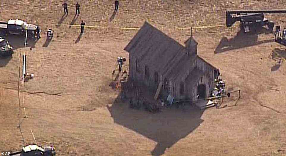 Police tape cordons of a small church used as a set for the movie, after a fatal accidental shooting at a Bonanza Creek Ranch movie set near Santa Fe on Thursday