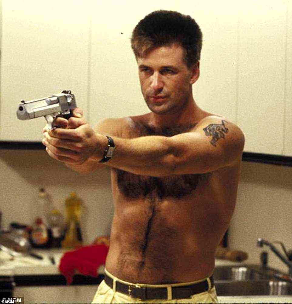 Alec Baldwin (pictured in Miami Blues) fired a live round towards the camera, accidentally killing Hutchins as she filmed him, and injuring director Joel Souza, who stood behind her