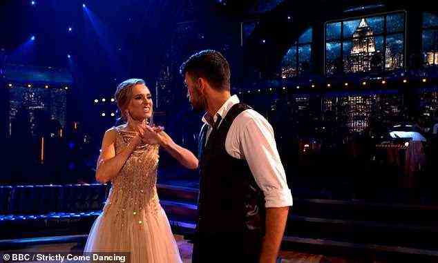 Battling it out: Rose looked unhappy with Giovanni as the pair mocked an argument as part of their performance