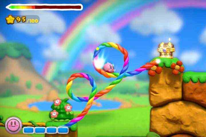 Kirby riding the rainbow path to a treasure.