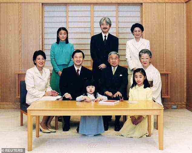 Princess Mako, in blue, in 2005 with members of the royal family including her parents (back row), uncle, centre, who is now the Emperor, and younger sister, in yellow